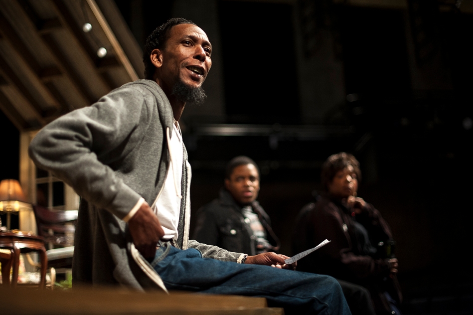 Ron Cephas Jones, a cast member, speaks with the visitors before the show. The actors described themselves and their ways of movement.